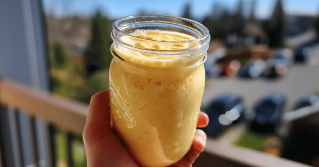 Banana peach smoothie with fresh fruit