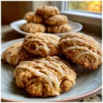 Close-up of delicious Cottage Cheese Cinnamon Roll Breakfast Cookies drizzled with icing.